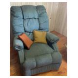 Teal recliner with pillows
