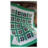 Green and white quilt