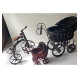 2 doll buggies and a tricycle