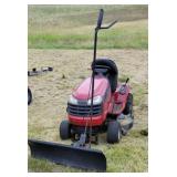 Craftsman lawn tractor with mower deck and plow.