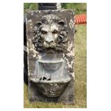 Lion water fountain.