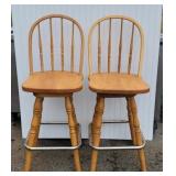 Pair swivel bar stools.