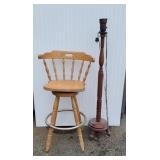 Swivel bar stool and floor lamp.