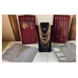 Necklaces and bracelets in maroon and grey