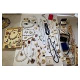 Bag of mixed costume jewelry - necklaces,