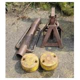 Wheel weights, jack stand, post pounder.