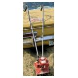 Mantis tiller. Car not included, lol.