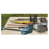 Yard tools, shovels and rakes.