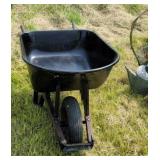 Wheel barrow. Holds water!