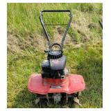 Yard machine rototiller.
