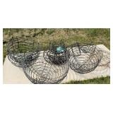 Multiple size old fashioned hanging baskets.