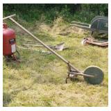 Wooden wheel cultivator
