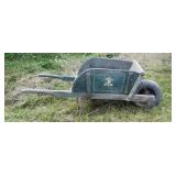 Green wooden wheel barrow