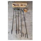 5 Tiki torches with stands. 5
