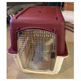 Large cream and maroon dog crate