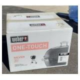 New in box Webber 1 touch charcoal grill.
