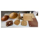 Box of wooden bowls, cutting boards, rolling pin,