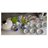 Box of coffee mugs, shell dishes, teapots etc