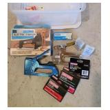 Staple guns and stapler.