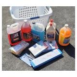 Basket lot of liquid cleaners, charcoal lighter,