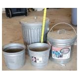 Galvanized buckets and trash cans.