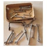 Open end and adjustable wrenches.