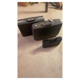 2 gun cases and a briefcase