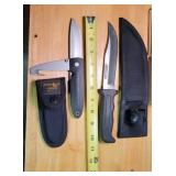 Buck jack knife and hunting knives with sheaths.