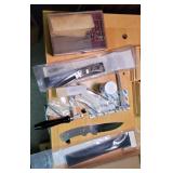 Box of knife related. Sharpening stones,