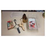 Clear tub with 2 slingshots and pellets/marbles