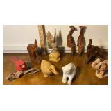 Flat of wood and stone animal figures - giraffes,