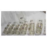 Set of 18 capital AMO A.D. glasses with matching