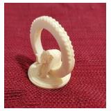 Ivory elephant in ring