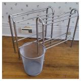 2 towel racks and trash can