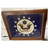 Framed embroidery of U.S. seal approx 23"x27"