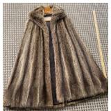 GORGEOUS monogrammed fur cape from Bergdorf