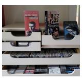 music cds, and cassettes (in white cabinet) -