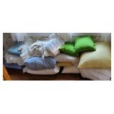 Huge pile of bedding including pretty white