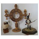 Two sign sculptures and wooden candle holder