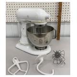 White KitchenAid stand mixer with attachments-
