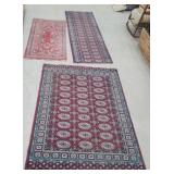 3 area rugs worn