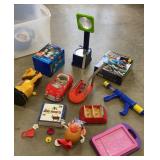 Clear tub of newer toys - Art projector, potato