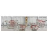 4 Pyrex measuring cups