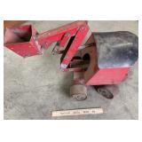 Vintage red metal toy truck with bucket