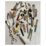 Box of retro can and bottle openers