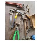 Pipe wrench, hammers, vise grips,etc