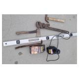 Pipe wrench, level, bit sharpener, etc