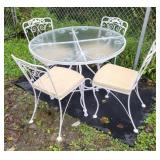 Iron glass top table and 4 chairs