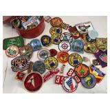 Red tin full of patches