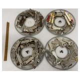 4 round clear containers full of retro